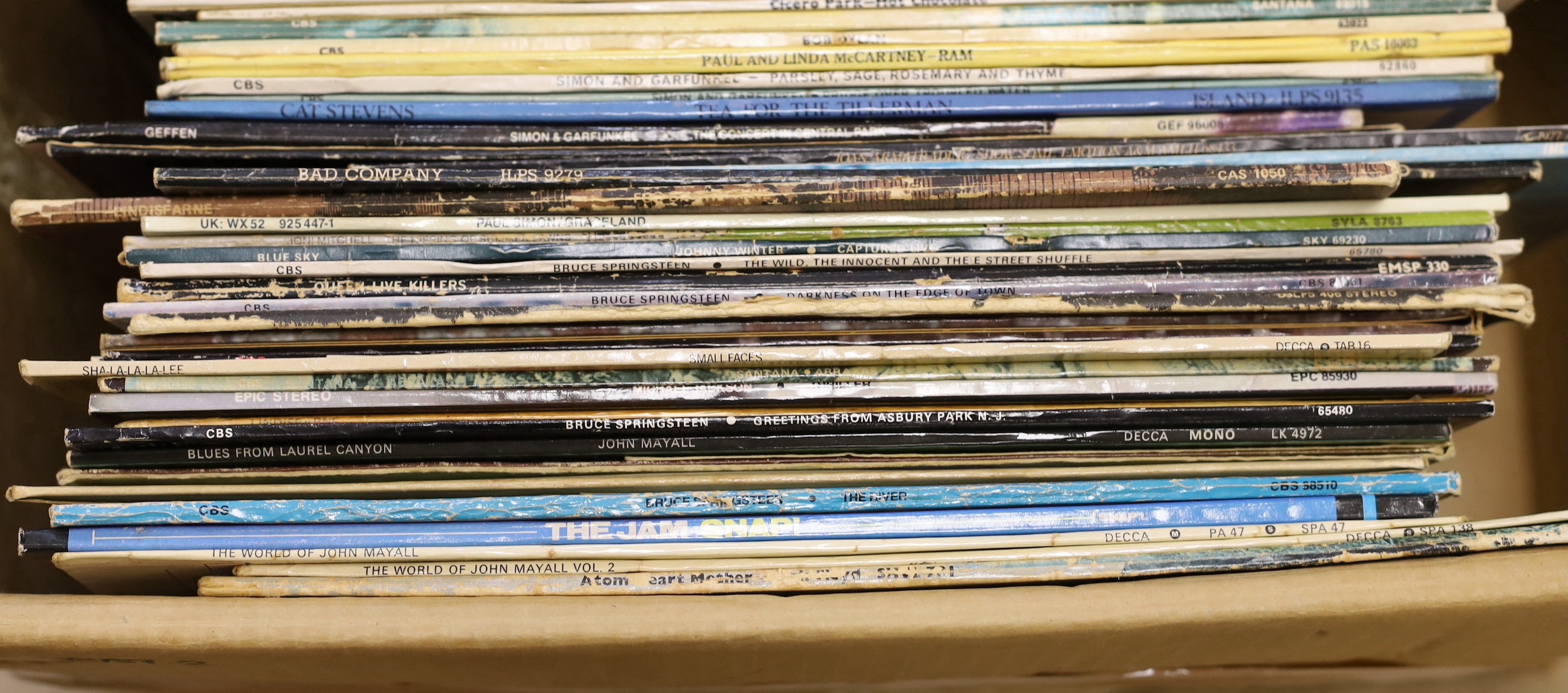 A box of 52 mixed rock and pop LP’s to include Cream, Small Faces, The Jam etc.
